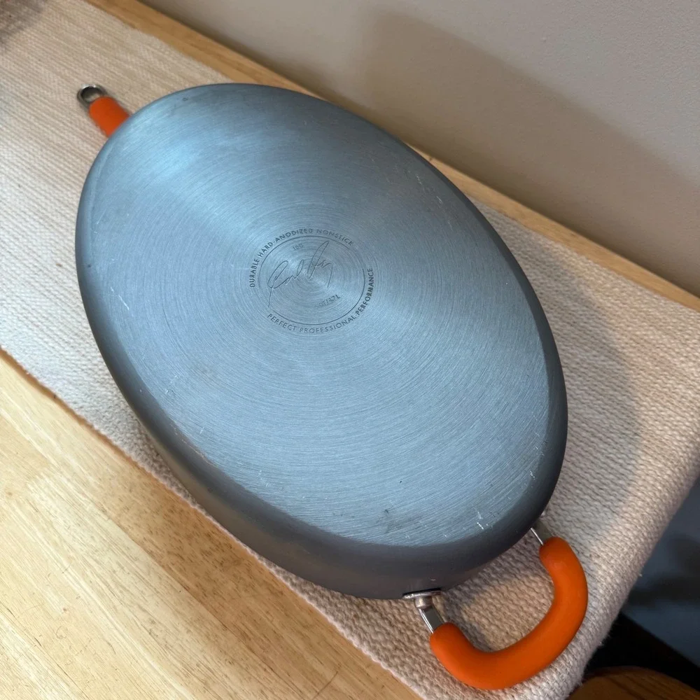 Rachael Ray Hard Anodized Nonstick Oval Saute Pan with‎ Lid Orange Handles